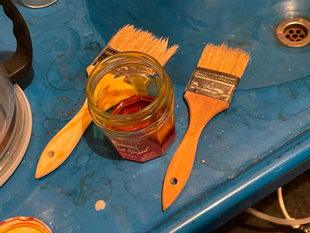 <strong>We created our sensitizer using a filtered mixture of 1 tablespoon of turmeric to 1/4 cup of 99% isopropyl alcohol.  These house painting brushes work fine, but we also like using hake brushes for coating. After some testing we found the best papers for this technique were washi - papers that do not contain sizing.</strong>